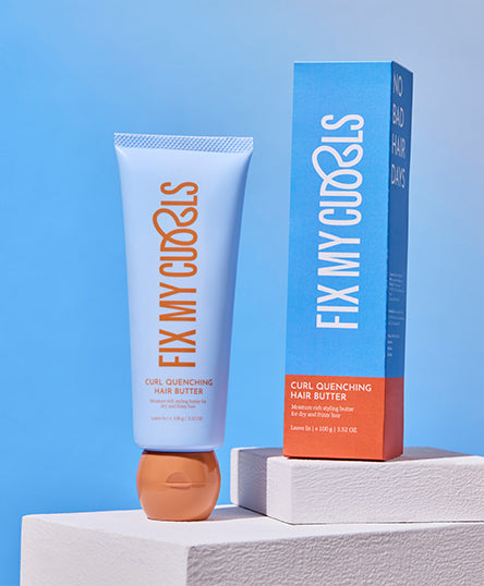 Tube and box of Curl Quenching Hair Butter of Fix My Curls on a blue background