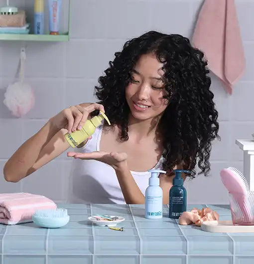 Model testing Fix My Curls products