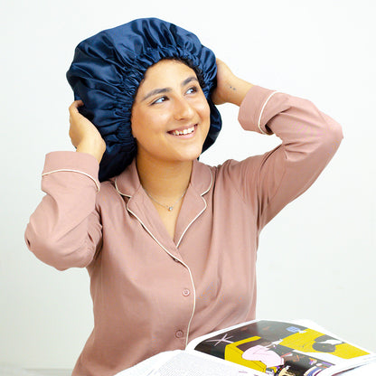 Woman smiling in a Blue Italian Satin Bonnet